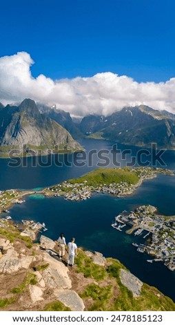 Similar – Image, Stock Photo Traveling couple admiring breathtaking landscape of bay in summer