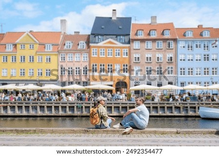 Similar – Foto Bild Kopenhagen liegt am Wasser und hat so viele Abschnitte an der Hafenfront. Eine Stadt, die von Wasser umgeben ist, Kopenhagen ist eine Freude für Schwimmer. Dieses Bild ist auch eine Freude für sexy Booties und lange Beine Liebhaber.