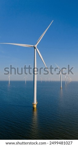 Similar – Image, Stock Photo huge wind turbine from frog perspective in front of blue sky