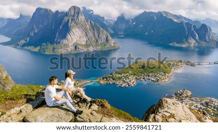 Similar – Image, Stock Photo Traveling couple admiring breathtaking landscape of bay in summer