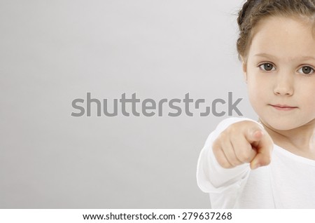Five years girl pointing with finger
