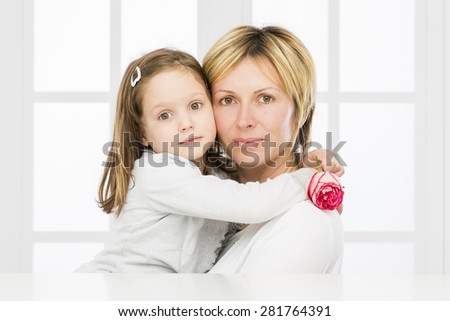 Forty years mother with\
her five years old daughter