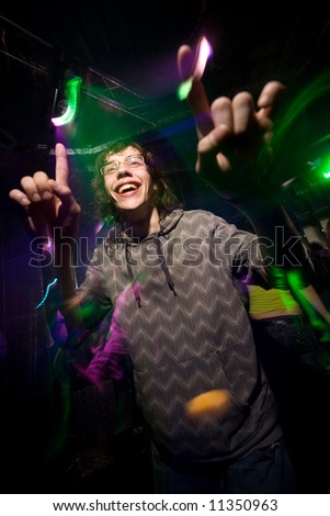 young man dancing in nightclub