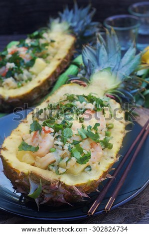 Pineapple Shrimp Fried Rice in a Fresh Pineapple Shell. Selective Focus