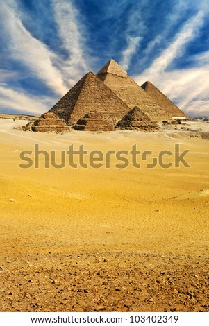 Egypt. Cairo - Giza. General view of pyramids from the Giza Plateau (from left: the Pyramid of Menkaure, Khafre and Chufu). The Pyramid Fields from Giza to Dahshur is on UNESCO World Heritage List