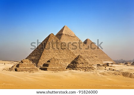Egypt. Cairo - Giza. General view of pyramids from the Giza Plateau (in order from left: the Pyramid of Menkaure /Mykerinos/, Khafre /Chephren/ and Chufu /Cheops/ - known as the Great Pyramid