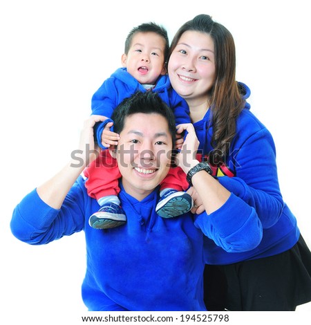 Young family three persons, smiling father mother and son