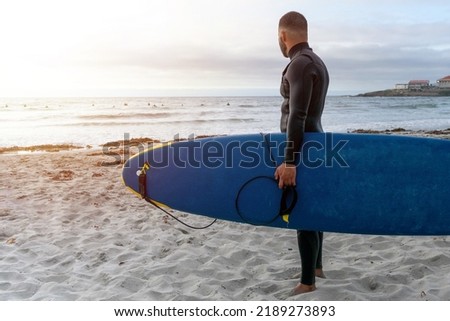 Similar – Image, Stock Photo Unrecognizable athlete practicing surfing on ocean wave