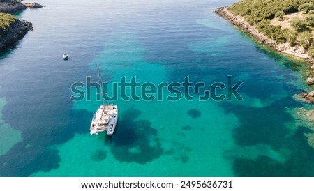 Similar – Image, Stock Photo Catamaran on the beach on a sunny day