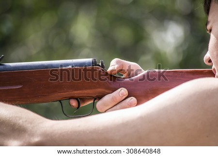 Teen and air rifle
