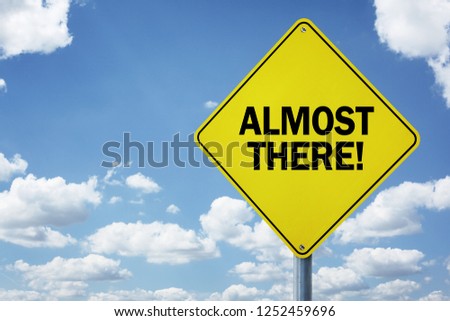 Almost there road sign concept for business motivation, encouragement and approaching a destination or goal 商業照片 © 