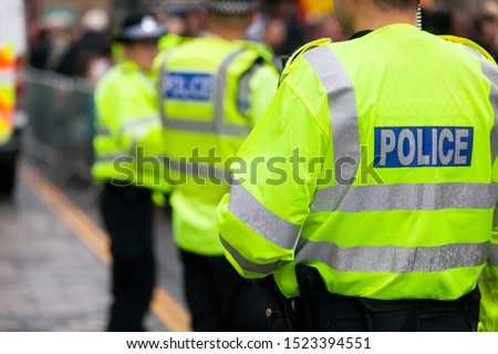 Police in hi-visibility jackets policing crowd control at a UK event Zdjęcia stock © 