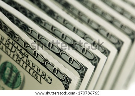 US paper currency one hundred dollar bills in a row