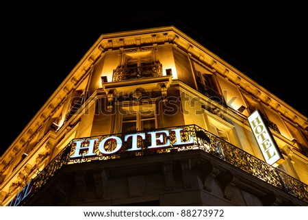 Illuminated hotel sign taken at night
