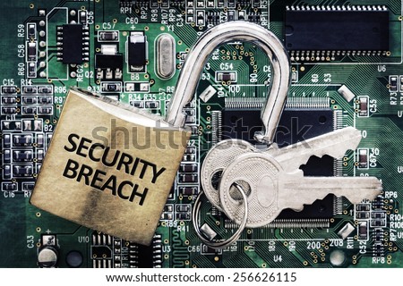 Internet computer security and network protection concept, padlock and key on circuit board