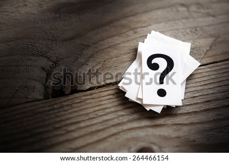 Question mark heap on table concept for confusion, question or solution Stockfoto © 