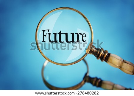 Magnifying glass focus on the word future concept for planning, vision and  looking forward