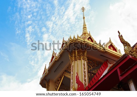 Ornately decorated temple. Generally in Thailand, Buddhist church created with money donated by people to hire artist. They are public domain of Buddhism, no restrict in copy, no name of artist appear
