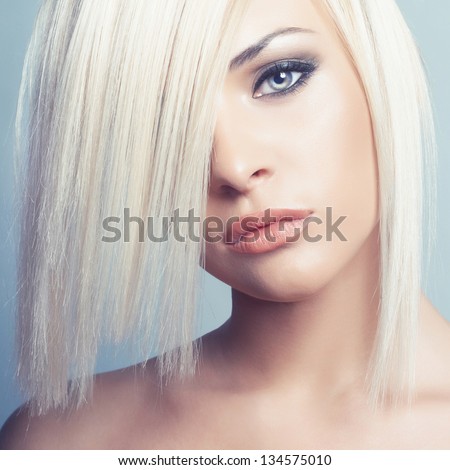 Fashion photo of beautiful sexy blonde with short haircut
