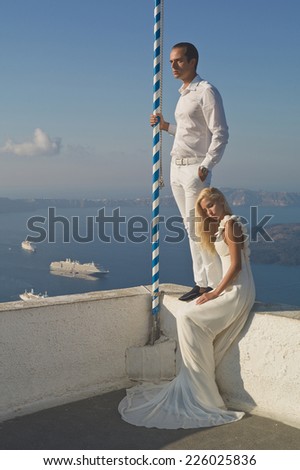 Fashion art photo of bride and groom on the seashore. Wedding