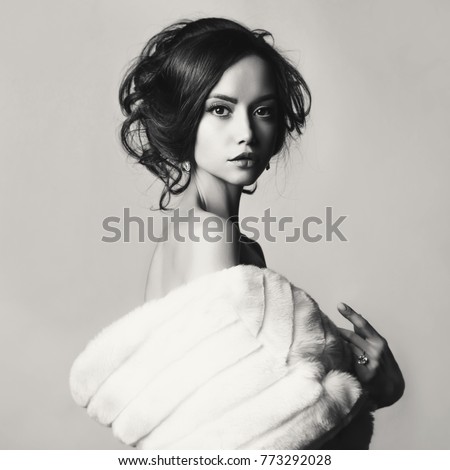 https://image.shutterstock.com/display_pic_with_logo/180403/773292028/stock-photo-fashion-studio-portrait-of-beautiful-lady-with-elegant-hairstyle-in-white-fur-coat-winter-beauty-773292028.jpg