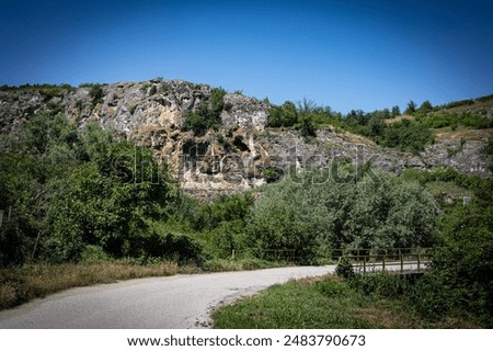 Similar – Image, Stock Photo Rock formation near path in nature