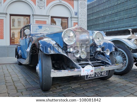 RIGA, LATVIA - JULY 10: Parade of antiquarian made till 1940 cars Rolls Royce arrange by the British Â«The 20-Ghost ClubÂ» July 10, 2012 in Riga, Latvia.