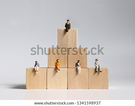 Wooden blocks and miniature people.  ストックフォト © 