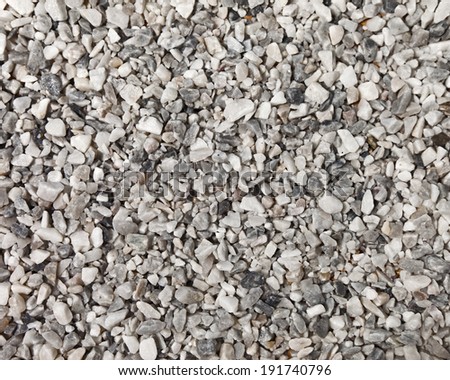 A flat background of small grey pebbles for background or texture.