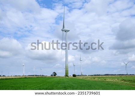 Similar – Image, Stock Photo huge wind turbine from frog perspective in front of blue sky