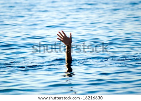 hand of man in water of open sea