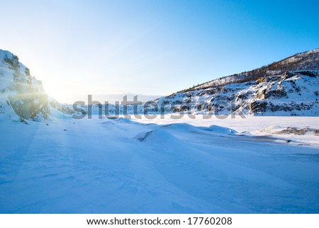 sunset in winter mountain tundra