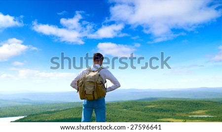 one traveler walking in north mountain tundra