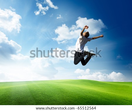 jumping happy young man
