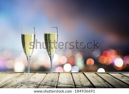 champagne Glasses and night city