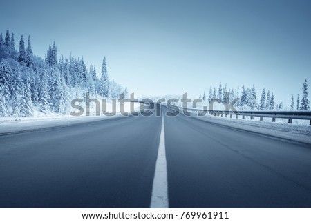 Similar – Foto Bild Winter verschneite leere Landstraße