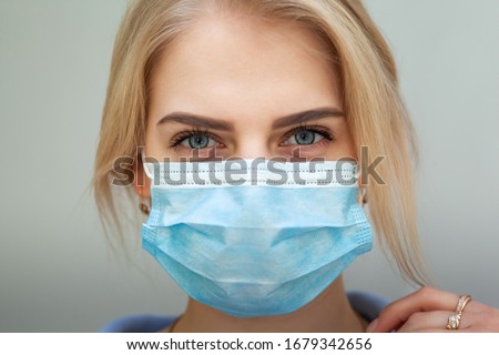 Similar – Image, Stock Photo Blonde woman with mask working on laptop in coffee shop