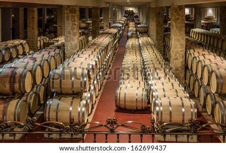 ARANDA DE DUERO, SPAIN - TORREMILANOS WINERY - MARCH 2013 - Cellar of wine aging in barrels