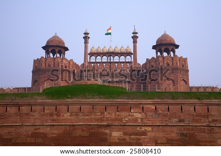 Antique indian red fort in Delhi with flag