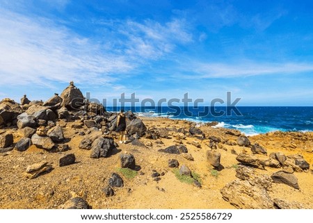 Similar – Image, Stock Photo Stones stacked on the beach, harmonious and balanced