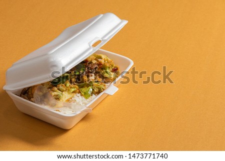 Similar – Image, Stock Photo Styrofoam box with food from snack bar on shimmering satin bed sheet