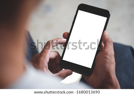 Similar – Image, Stock Photo Businessman hand holding mobile smartphone digital marketing online technology and communication social network with computer laptop internet browsing and shopping online on desk concept.