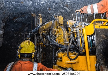 Similar – Image, Stock Photo Miner in the mine. Well-uniformed miner inside mine raising thumb