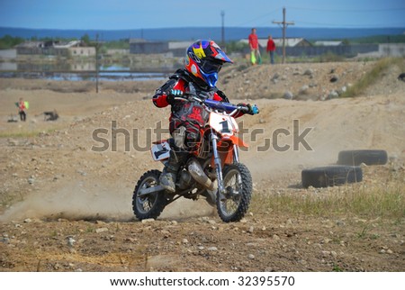 MONCHEGORSK, RUSSIA, JUNE 14: Motorcross racers get ready to start the 2nd stage of the championship race called 