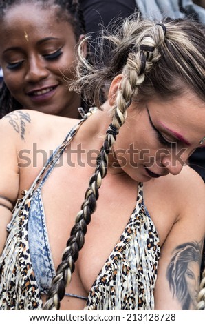LONDON - AUGUST 24: Performers take part in the First day of Notting Hill Carnival, August 24, 2014 in London, UK.
