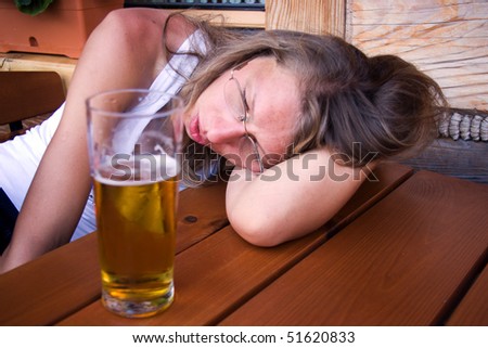 Similar – Image, Stock Photo Drunk alcoholic young girl lying on the floor feeling sick by drinking red wine, empty glass and bottle knock-out