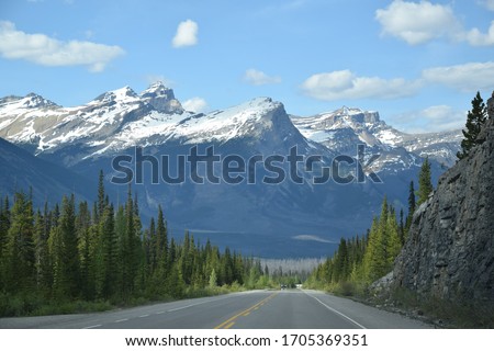 Similar – Image, Stock Photo Rocky mountains with clouds