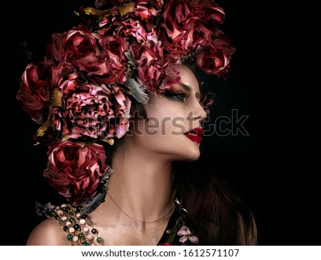 close up portrait of young beautiful girl with flower professional makeup. flower crown on head.  bright face art. spring fairy of flowers. Profile