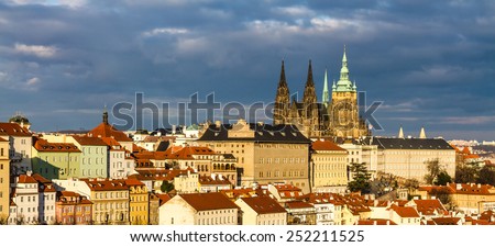View of St. Vitus Cathedral and Prague Castle with Green Park and Cloudy Sky - Prague, Czech Republic