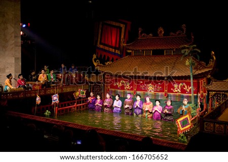 15 MAY 2011 - HANOI, VIETNAM - Performers during the water puppets show, on 15 May 2011, in Hanoi, vietnam